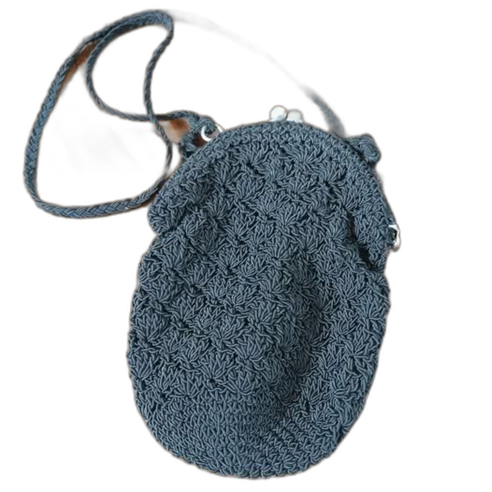 vintage black crocheted handbag with a snap closure